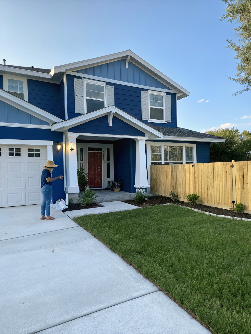 Exterior home painting project showing clean lines