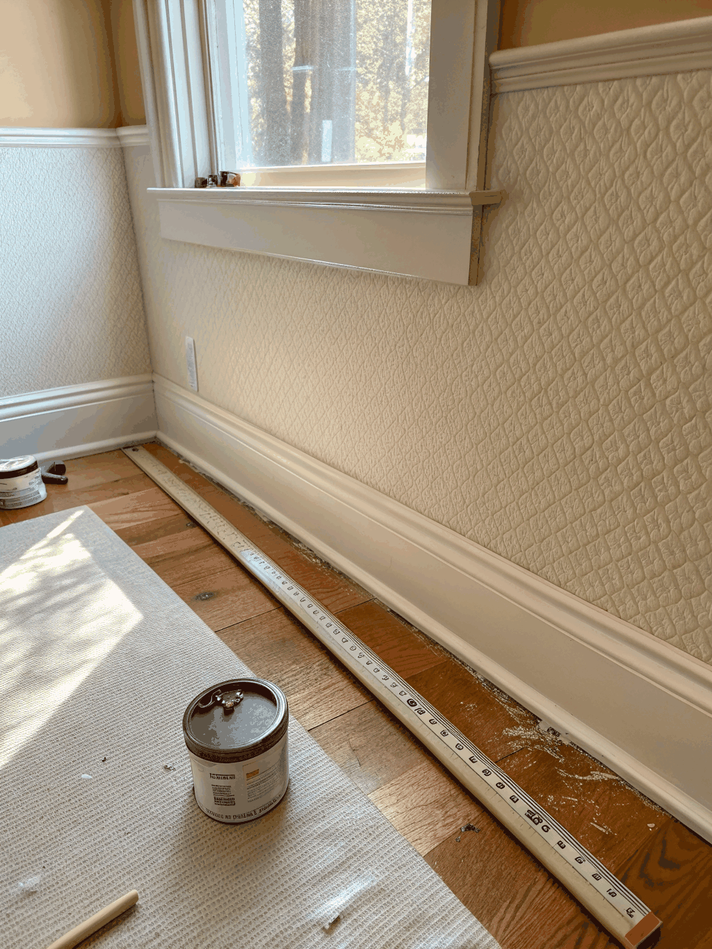 Professional wallpaper installation showing precise seam alignment